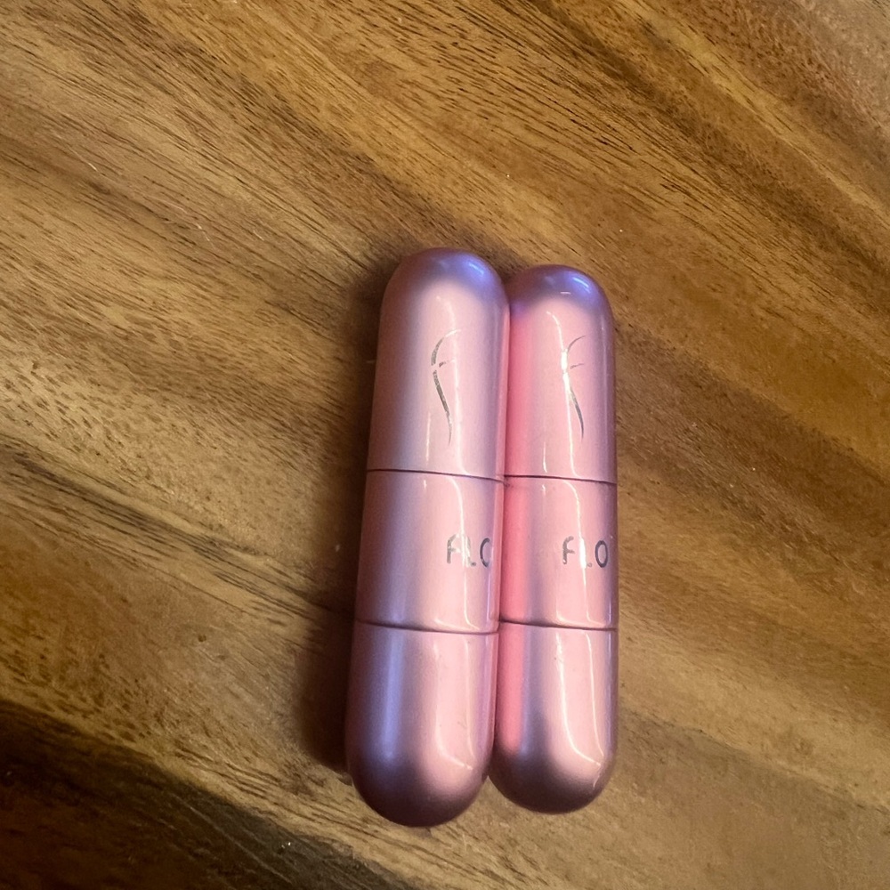 Pink flo travel perfume atomizers... Washed out with rubbing alcohol to clean